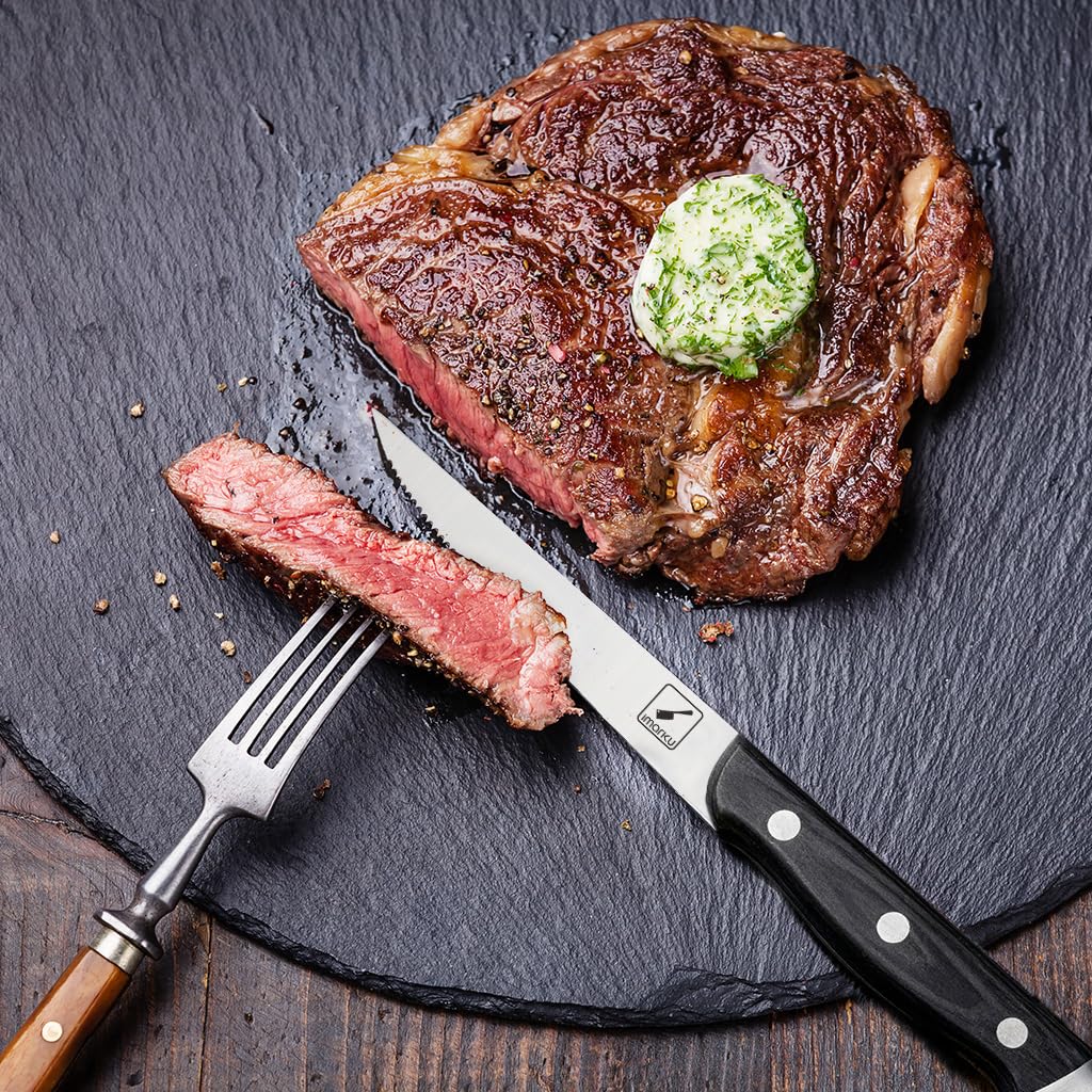 a pictue of a steak with a steak knife