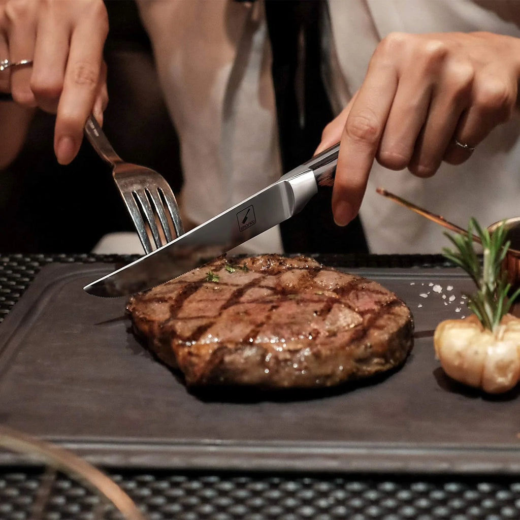 slicing steak with a steak knife