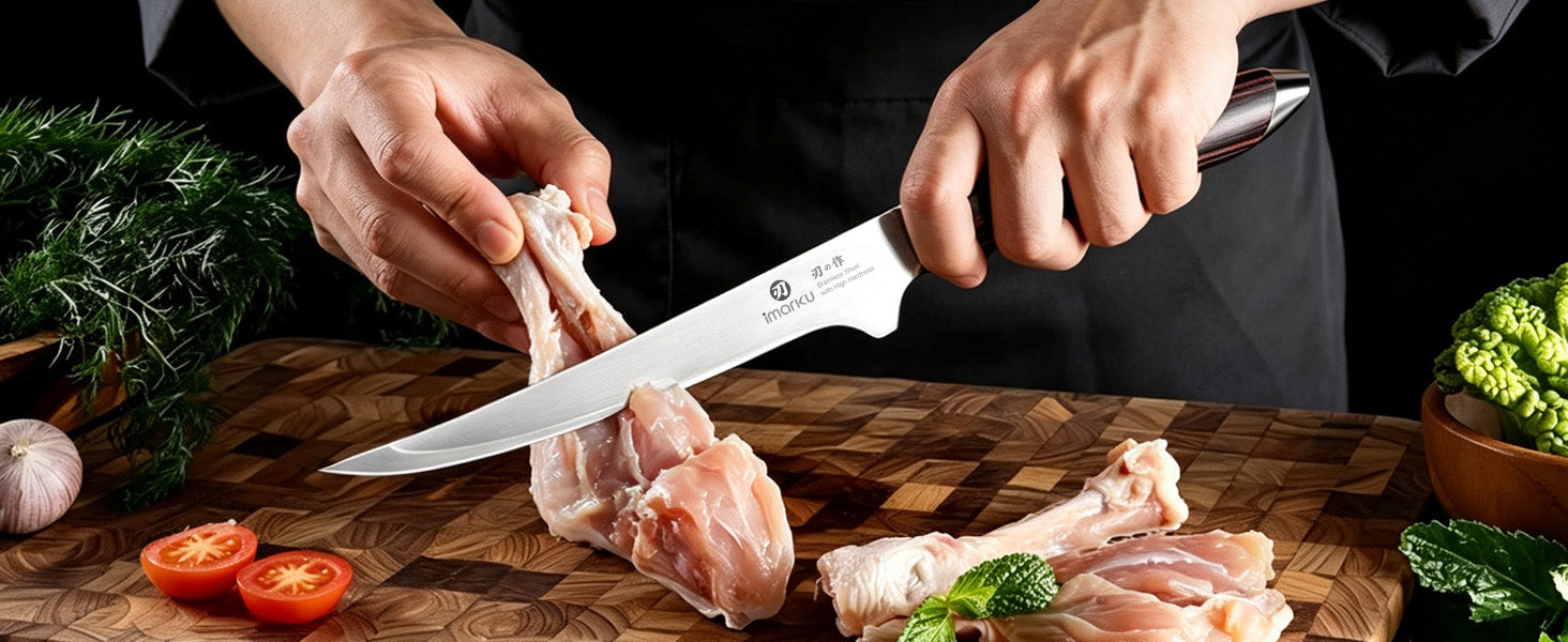Using Imarku boning knife to cut raw chicken